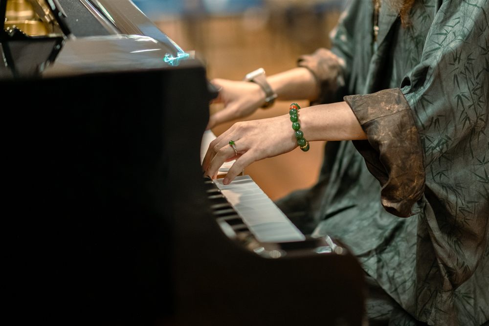 Piano lesson close-up with teacher guidance