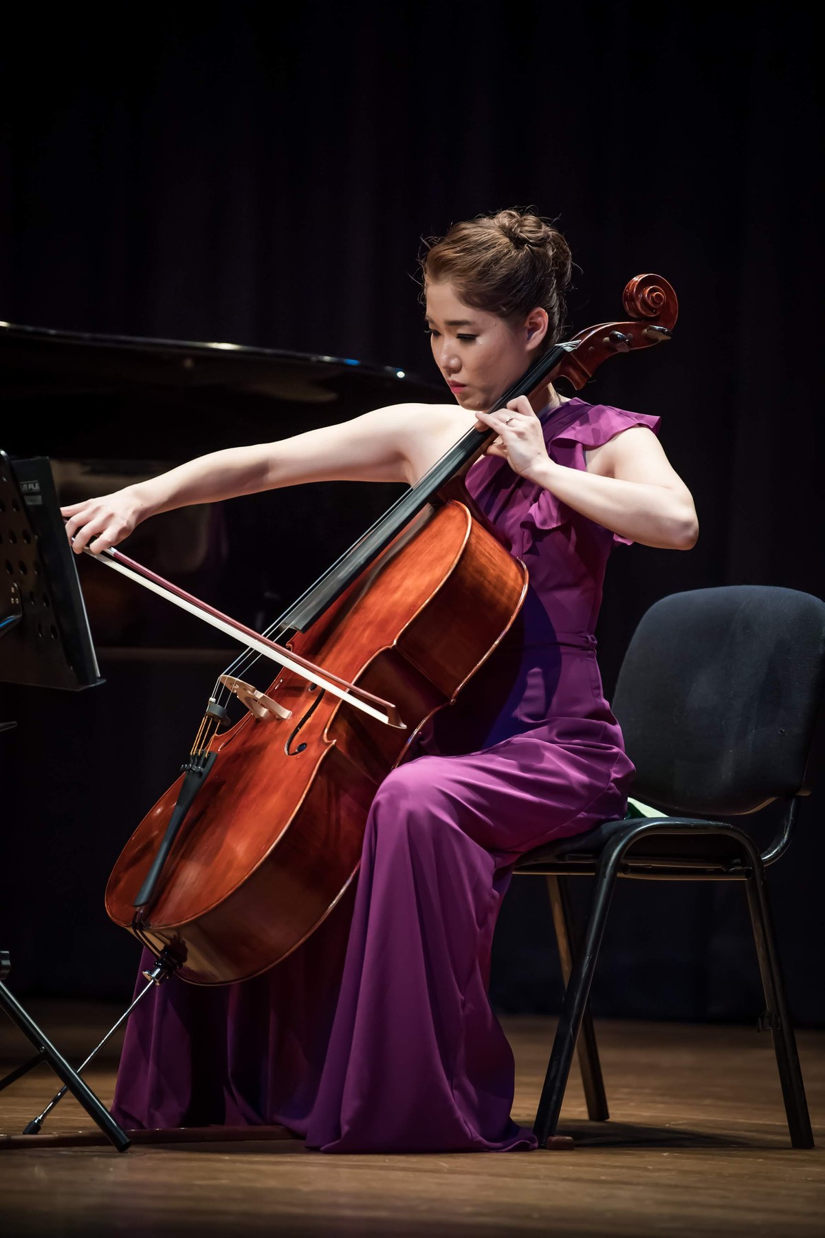 Cellist performing at Cosmos Total Music